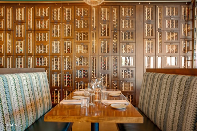 unfurnished dining area featuring indoor bar