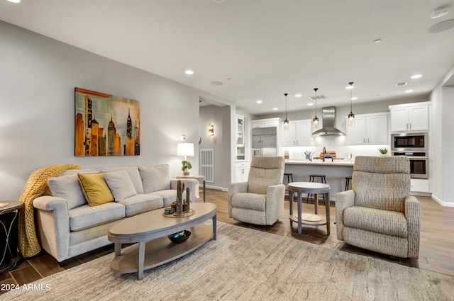 living room featuring dark wood-type flooring