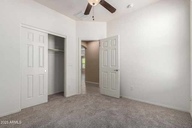 15588 W Devonshire Ave, Goodyear, AZ 85395 - unfurnished bedroom with carpet floors, arched walkways, and a closet