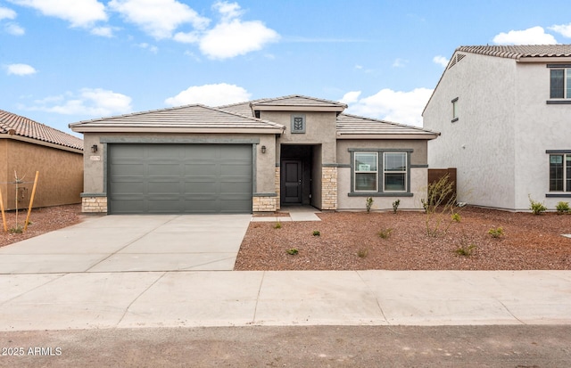 view of front of home with a garage