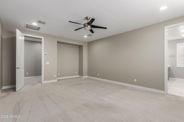 unfurnished bedroom with recessed lighting, visible vents, baseboards, and light colored carpet