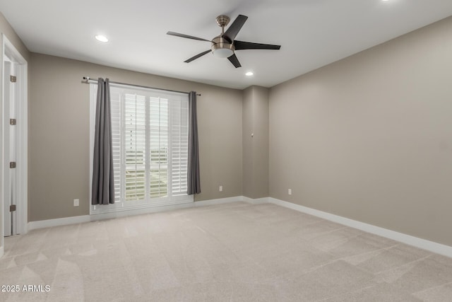 spare room with recessed lighting, baseboards, a ceiling fan, and carpet floors