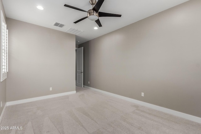 unfurnished room with a ceiling fan, visible vents, baseboards, recessed lighting, and light carpet