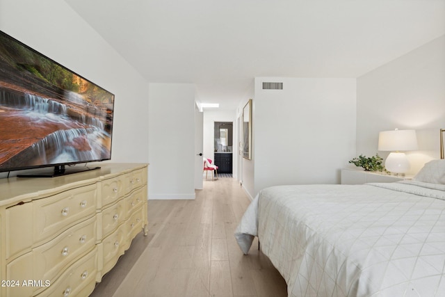 bedroom featuring light hardwood / wood-style flooring