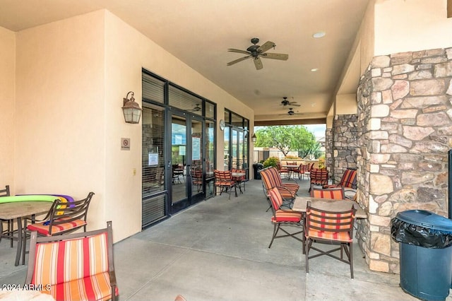 view of patio / terrace featuring ceiling fan