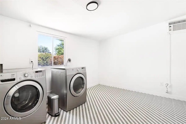 laundry area with separate washer and dryer