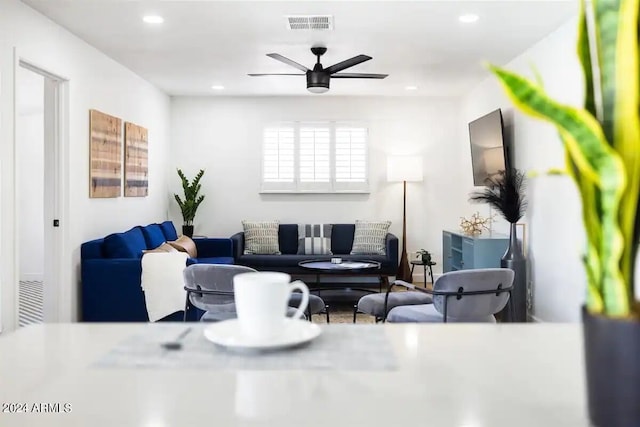 living room featuring ceiling fan