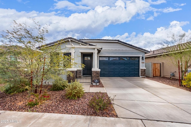 view of front of property featuring a garage, fence, driveway, and stucco siding