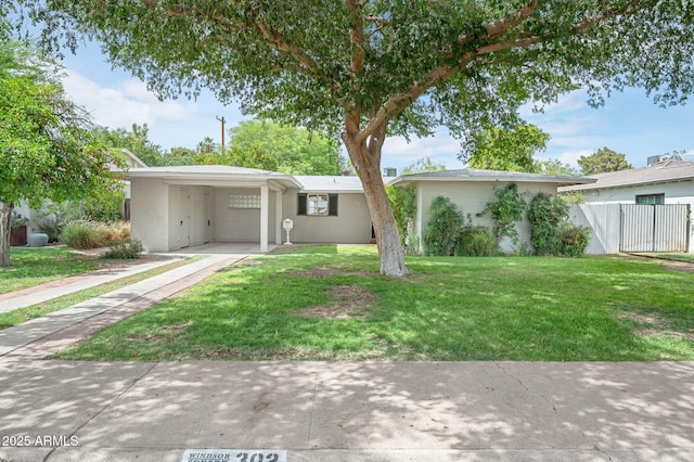 302 E Orange Dr, Phoenix, AZ 85012 - single story home with driveway and a carport
