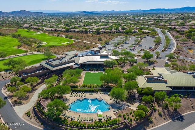 birds eye view of property with a mountain view