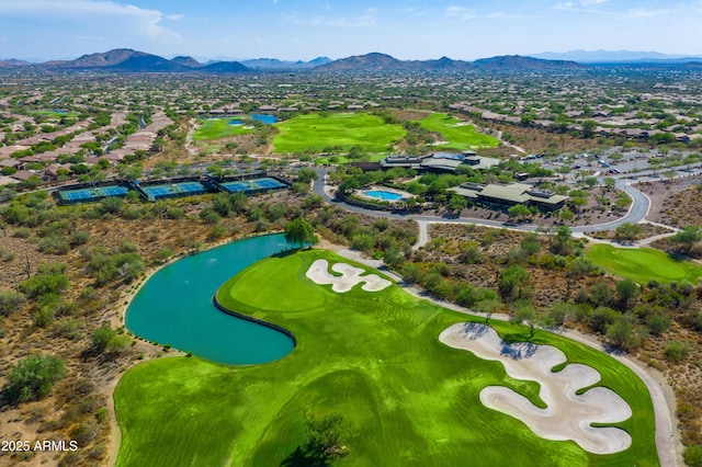 birds eye view of property featuring a water and mountain view