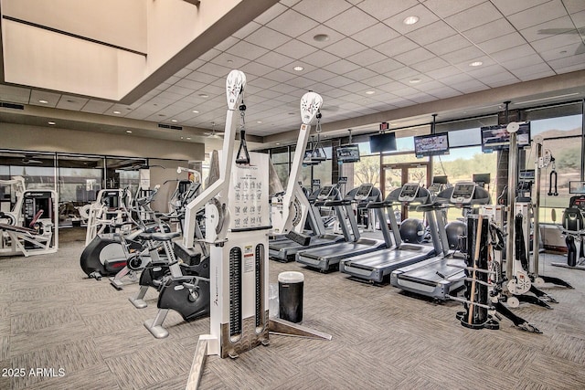 workout area with carpet flooring and visible vents