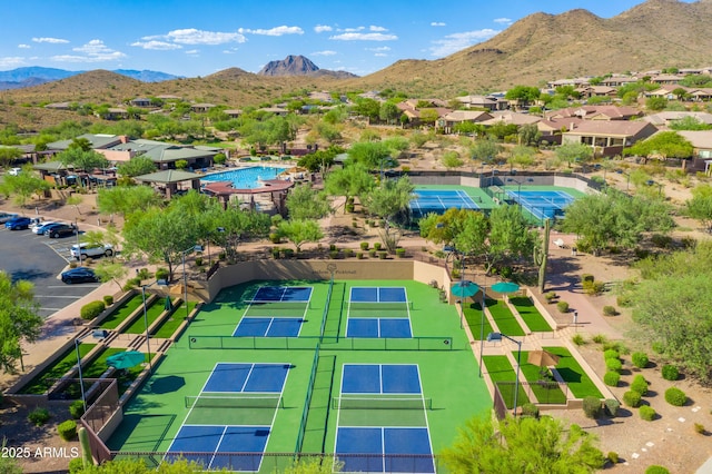 birds eye view of property featuring a mountain view