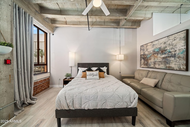 114 W Adams St Unit 202, Phoenix, AZ 85003 - bedroom with light wood-style floors and ceiling fan