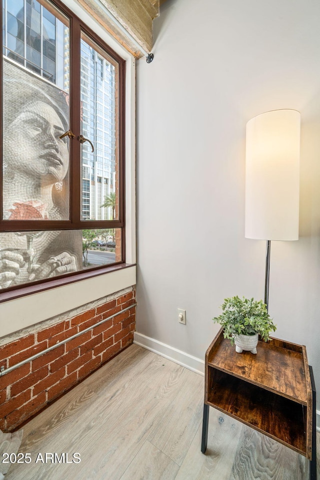 114 W Adams St Unit 202, Phoenix, AZ 85003 - living area featuring wood finished floors and baseboards