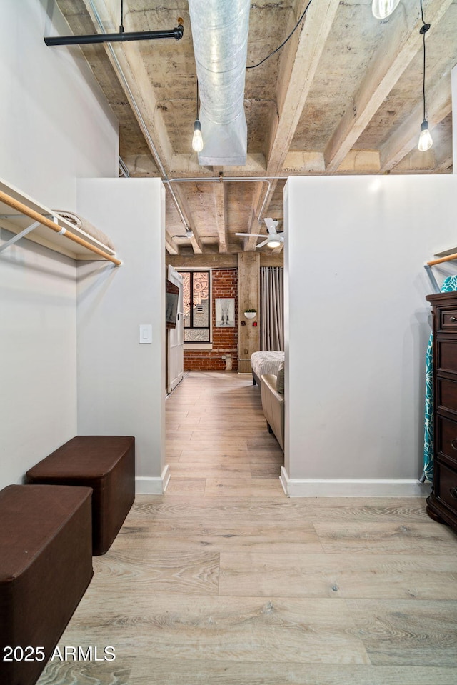 114 W Adams St Unit 202, Phoenix, AZ 85003 - basement featuring wood finished floors and baseboards