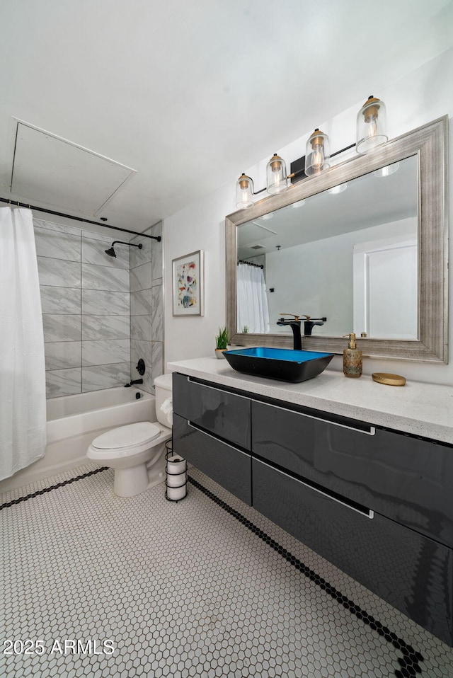 114 W Adams St Unit 202, Phoenix, AZ 85003 - bathroom featuring vanity, shower / tub combo, and tile patterned flooring