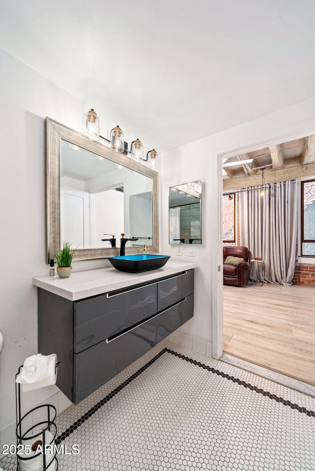 114 W Adams St Unit 202, Phoenix, AZ 85003 - bathroom with vanity and wood finished floors
