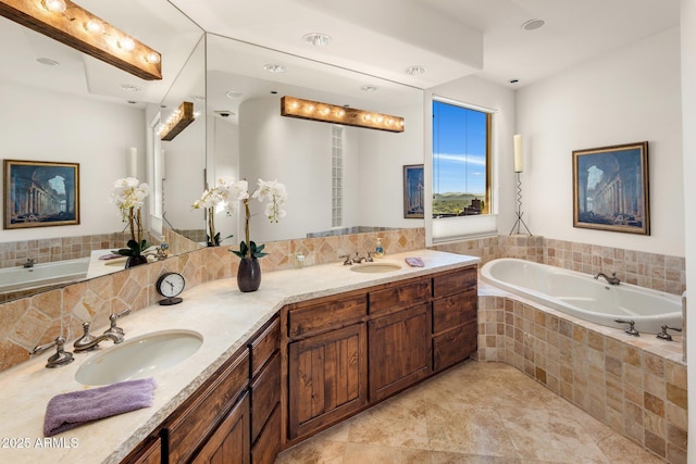 6001 E Restin Rd, Cave Creek, AZ 85331 - bathroom featuring double vanity, a garden tub, tile patterned floors, and a sink
