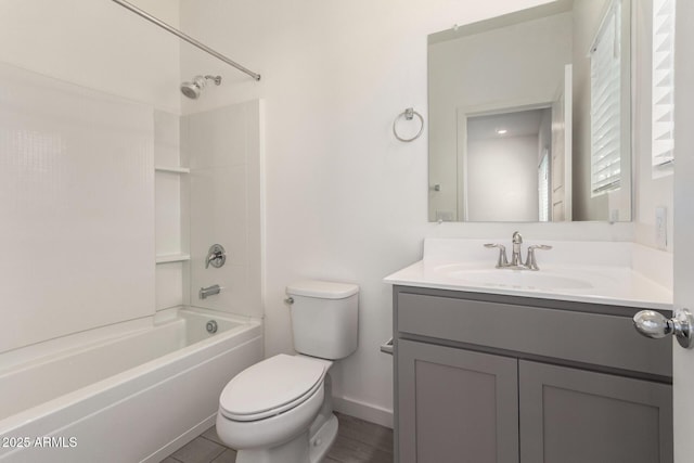 full bathroom with washtub / shower combination, vanity, and toilet