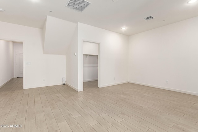 unfurnished room featuring light hardwood / wood-style flooring