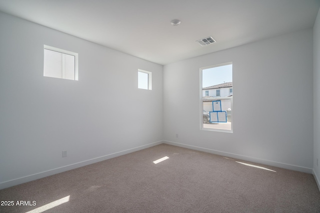 7956 W Griswold Rd, Peoria, AZ 85345 - carpeted empty room with baseboards