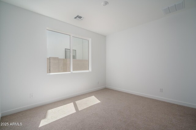 7956 W Griswold Rd, Peoria, AZ 85345 - carpeted spare room with baseboards