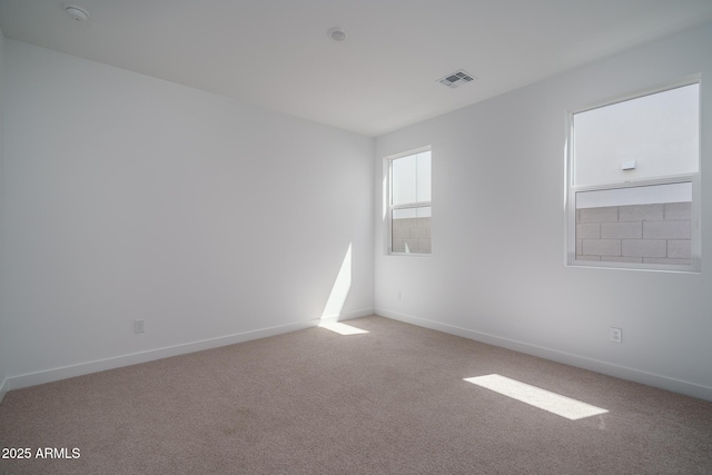 7956 W Griswold Rd, Peoria, AZ 85345 - carpeted empty room featuring baseboards and a smoke detector