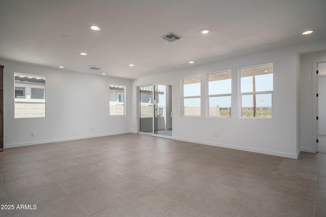 7956 W Griswold Rd, Peoria, AZ 85345 - spare room featuring recessed lighting and baseboards