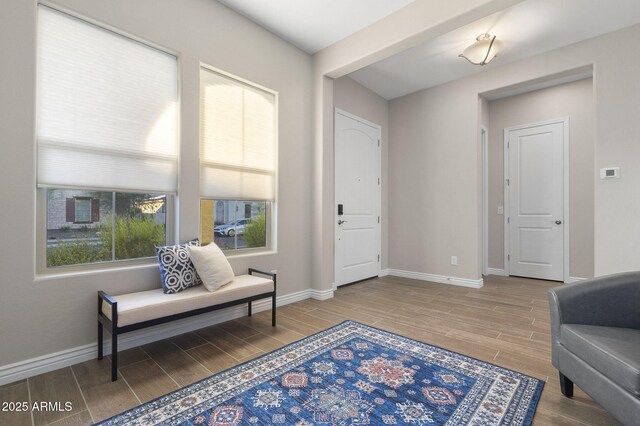 5245 N 205th Ln, Buckeye, AZ 85396 - sitting room featuring baseboards and wood finish floors