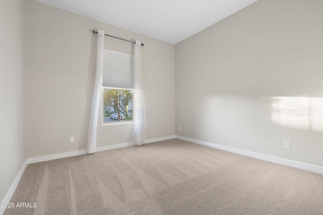 5245 N 205th Ln, Buckeye, AZ 85396 - empty room featuring baseboards and carpet