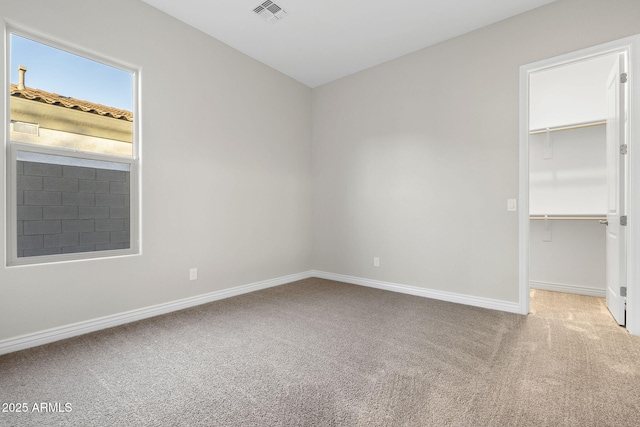 5245 N 205th Ln, Buckeye, AZ 85396 - carpeted spare room featuring baseboards and visible vents