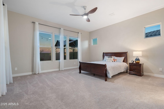 5245 N 205th Ln, Buckeye, AZ 85396 - bedroom with carpet flooring, baseboards, and ceiling fan