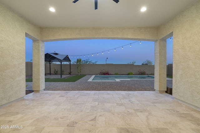 5245 N 205th Ln, Buckeye, AZ 85396 - view of patio featuring a fenced backyard and a fenced in pool