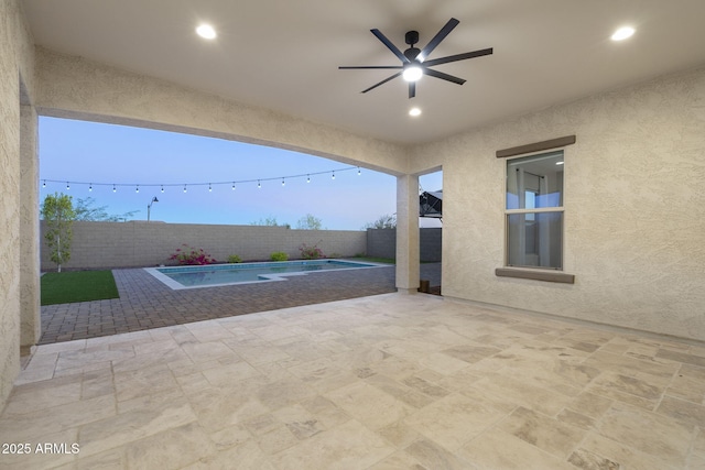 5245 N 205th Ln, Buckeye, AZ 85396 - view of patio featuring a fenced backyard, a fenced in pool, and a ceiling fan