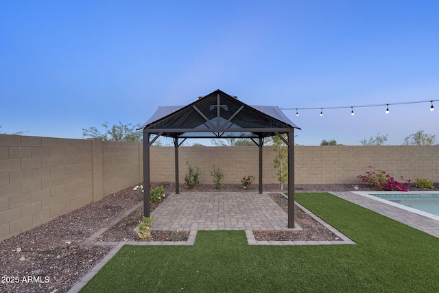 5245 N 205th Ln, Buckeye, AZ 85396 - view of yard with a patio, a fenced in pool, and a fenced backyard