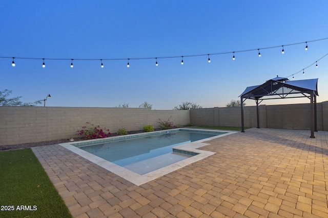5245 N 205th Ln, Buckeye, AZ 85396 - view of pool featuring a fenced backyard, a fenced in pool, and a patio area