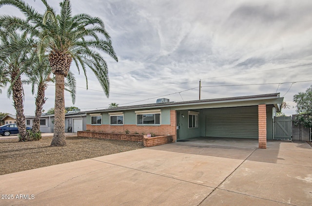 ranch-style home with a carport