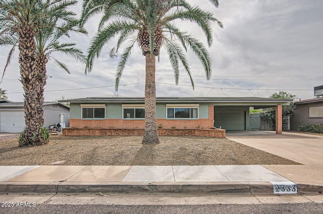 view of front of home with a carport