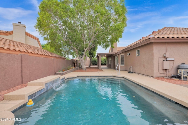 view of pool featuring a fenced in pool, a patio, and a fenced backyard