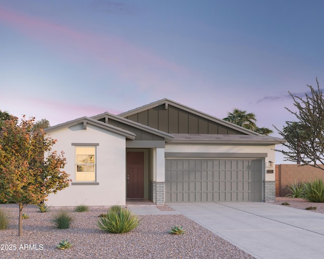 ranch-style house with concrete driveway, stucco siding, board and batten siding, and a garage