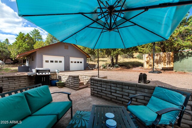 3219 N Pinewood Dr, Pine, AZ 85544 - view of patio with a garage, an outbuilding, and outdoor lounge area