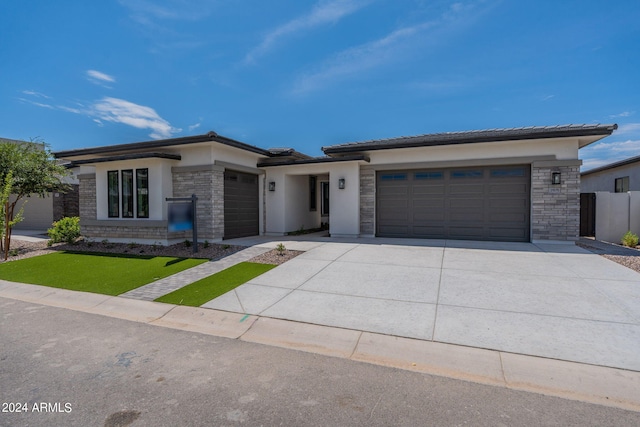 prairie-style home with a garage