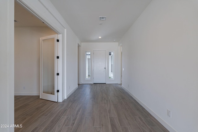 entrance foyer featuring french doors and wood-type flooring