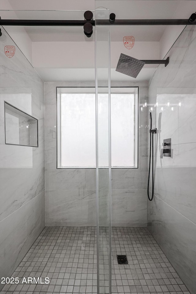 bathroom featuring walk in shower