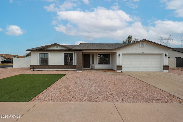 single story home featuring a garage and a front lawn