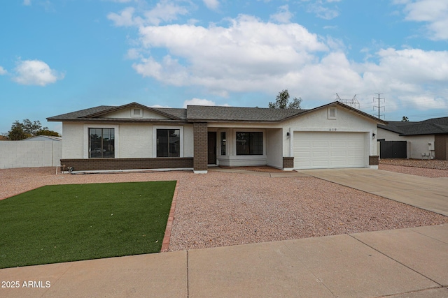 ranch-style house featuring a front yard and a garage