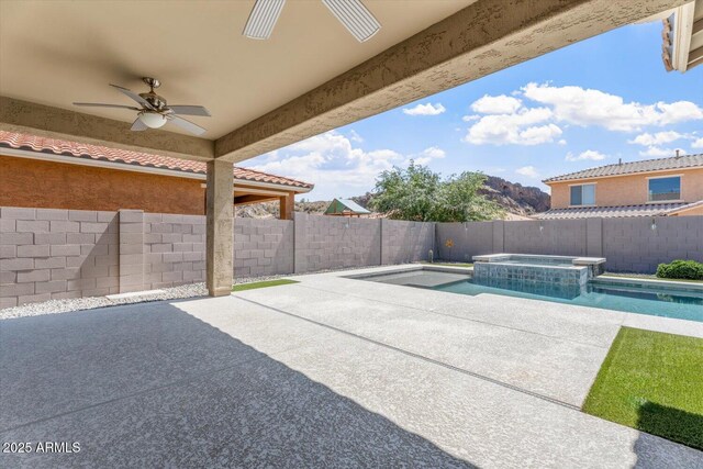 10417 W Alyssa Ln, Peoria, AZ 85383 - view of patio / terrace with ceiling fan, a fenced backyard, and a pool with connected hot tub