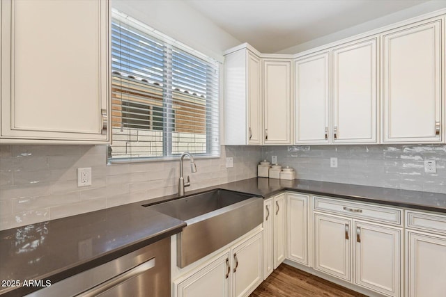 10417 W Alyssa Ln, Peoria, AZ 85383 - kitchen with decorative backsplash, a sink, and dark countertops
