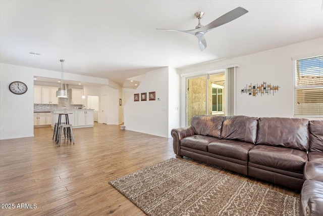 10417 W Alyssa Ln, Peoria, AZ 85383 - living area with visible vents, ceiling fan, and light wood-type flooring